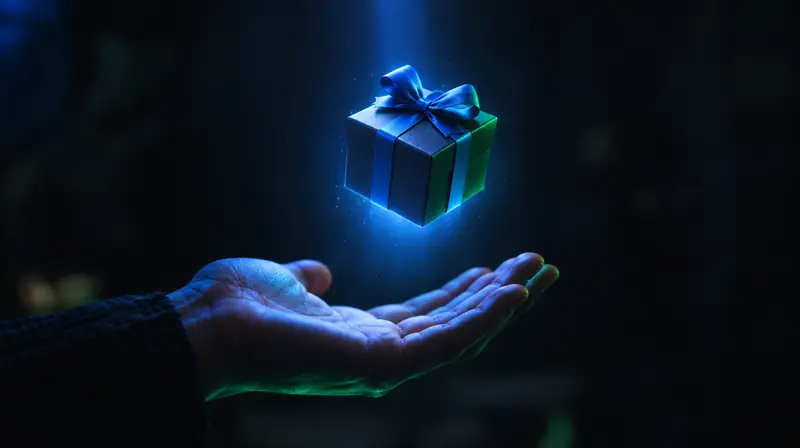 Mano abierta recibiendo una pequeña caja de regalo